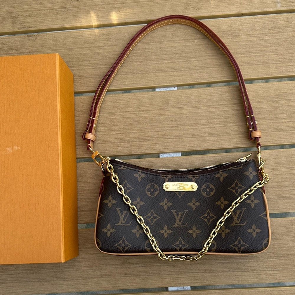 Louis Vuitton - The Pochette Liv in Monogram